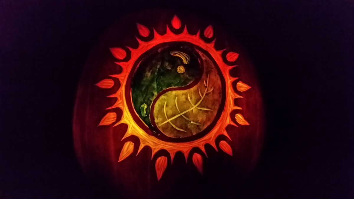 A pumpkin carved with the Island Horticulture logo.