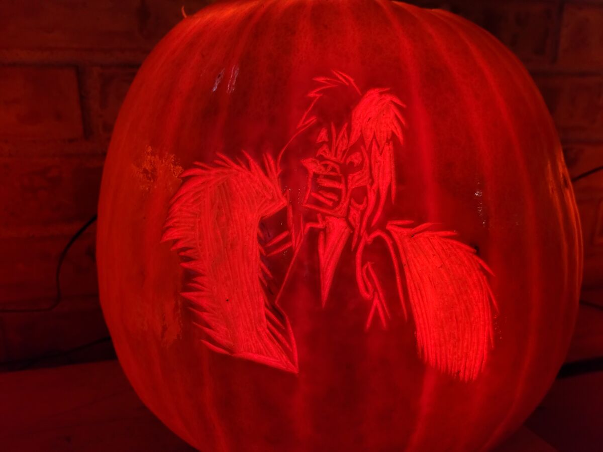 A pumpkin carved with Cruella de Vil from 101 Dalmatians.