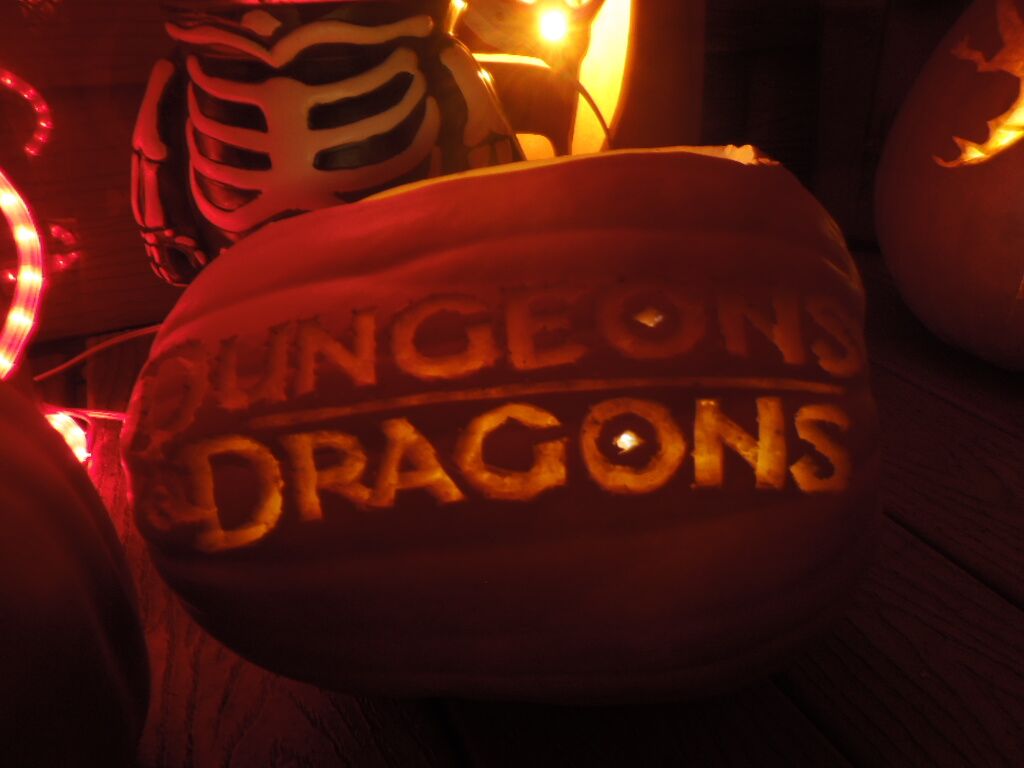 A pumpkin carved with the Dungeons & Dragons logo.