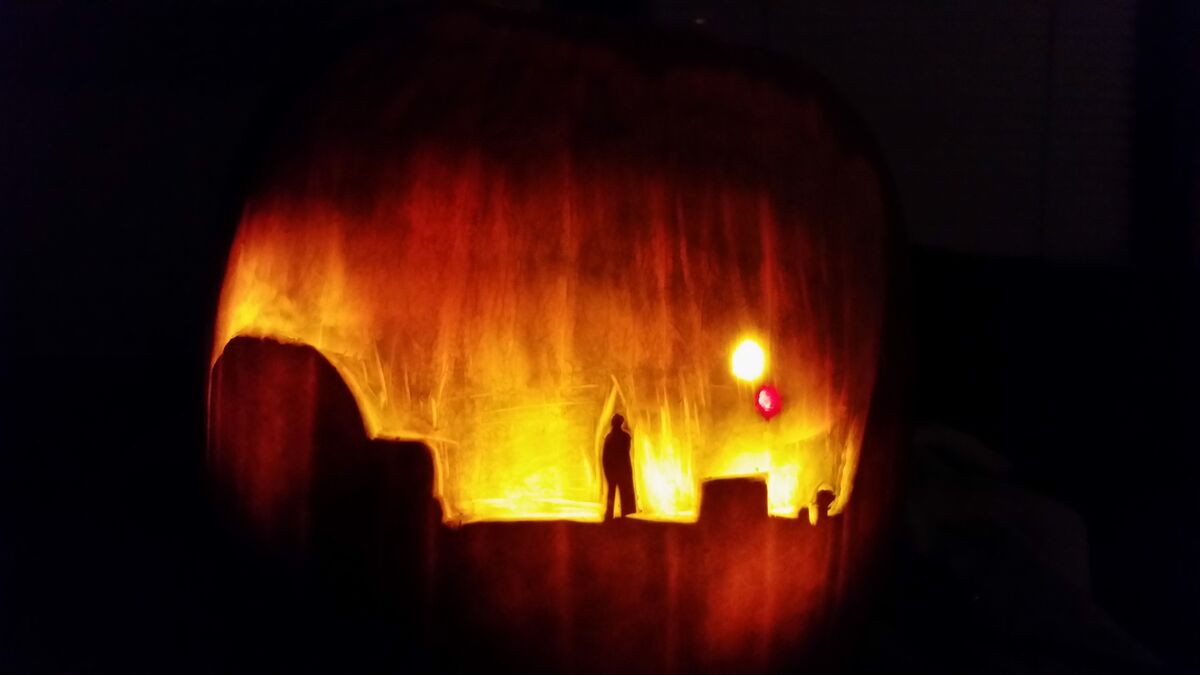 A pumpkin carved with Tatooine from Star Wars.