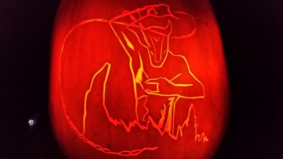 A pumpkin carved with the Holy Diver album art by Dio.