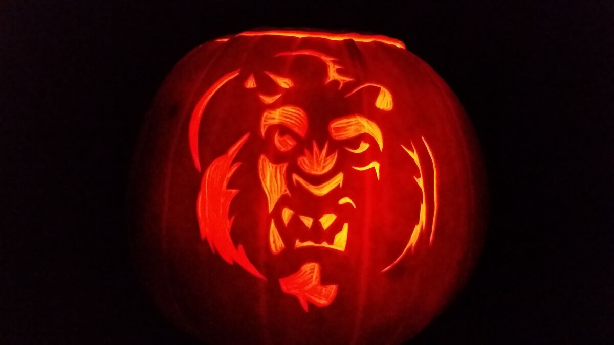A pumpkin carved with Beast from Beauty and the Beast.