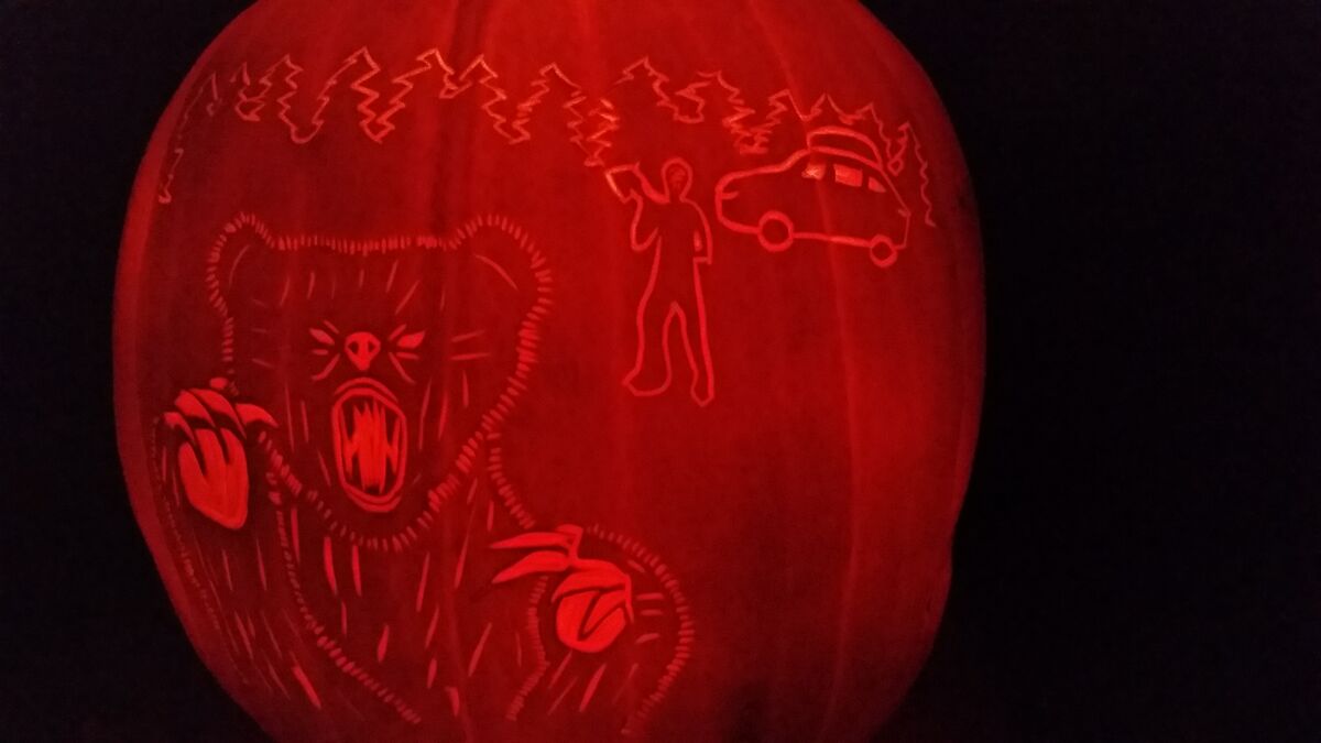 A pumpkin carved with imagery from Grizzly (1976).