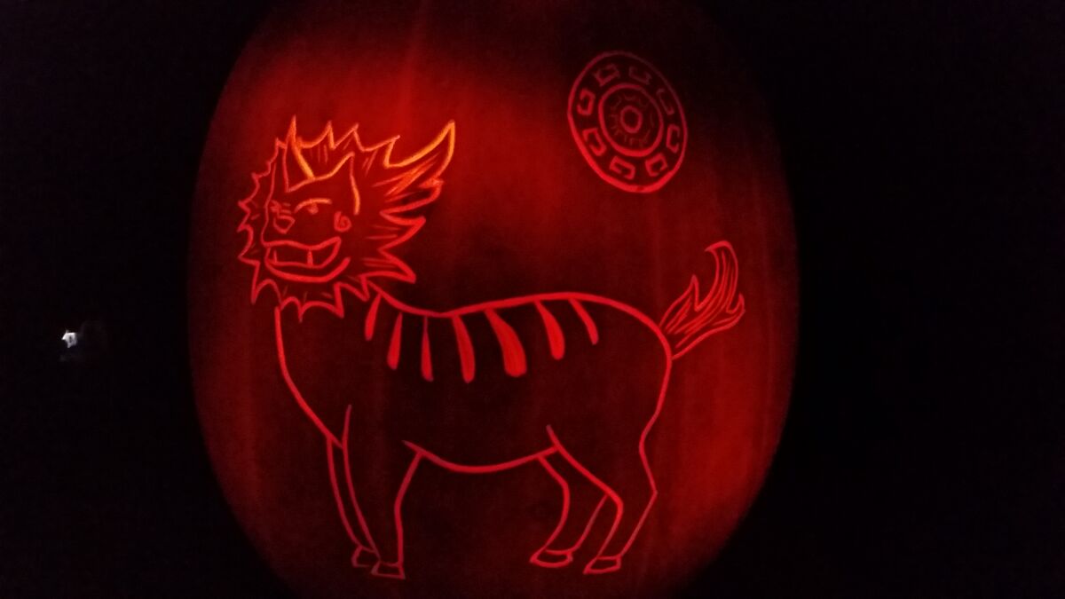 A pumpkin carved with a xiezhi, a beast from Chinese mythology.