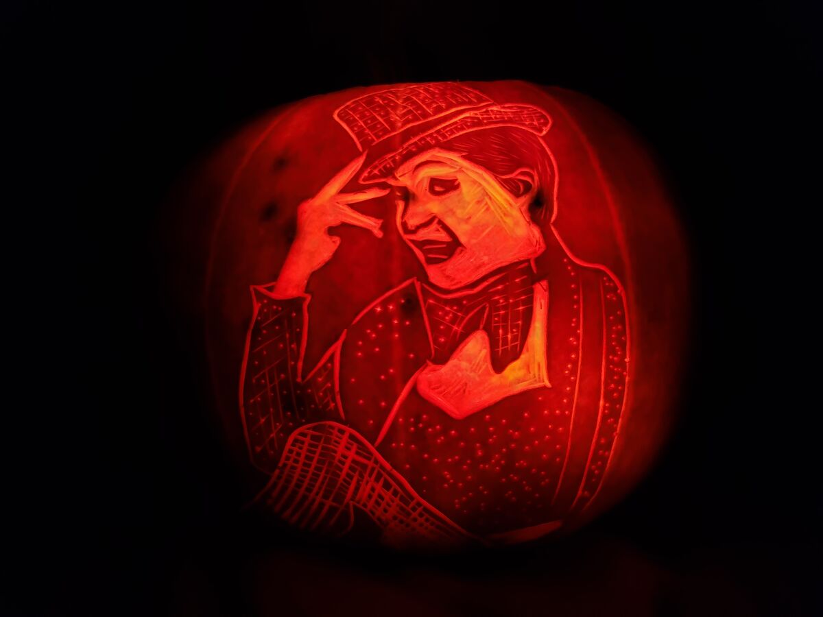 A pumpkin carved with Columbia from The Rocky Horror Picture Show.