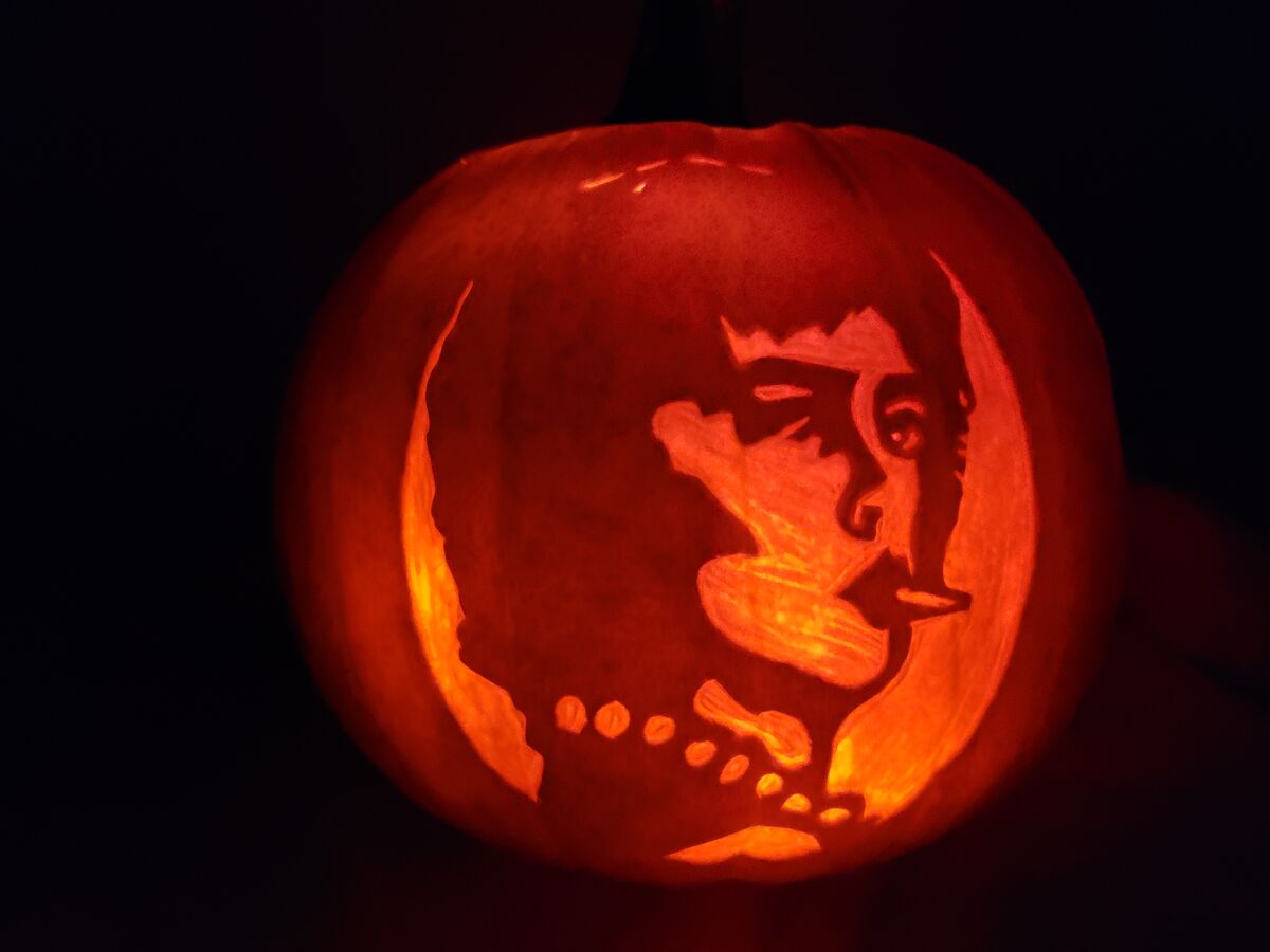 A pumpkin carved with Dr. Frank-N-Furter from The Rocky Horror Picture Show.