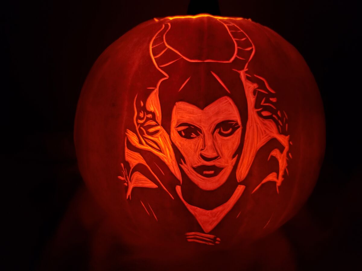 A pumpkin carved with Maleficent from Sleeping Beauty.
