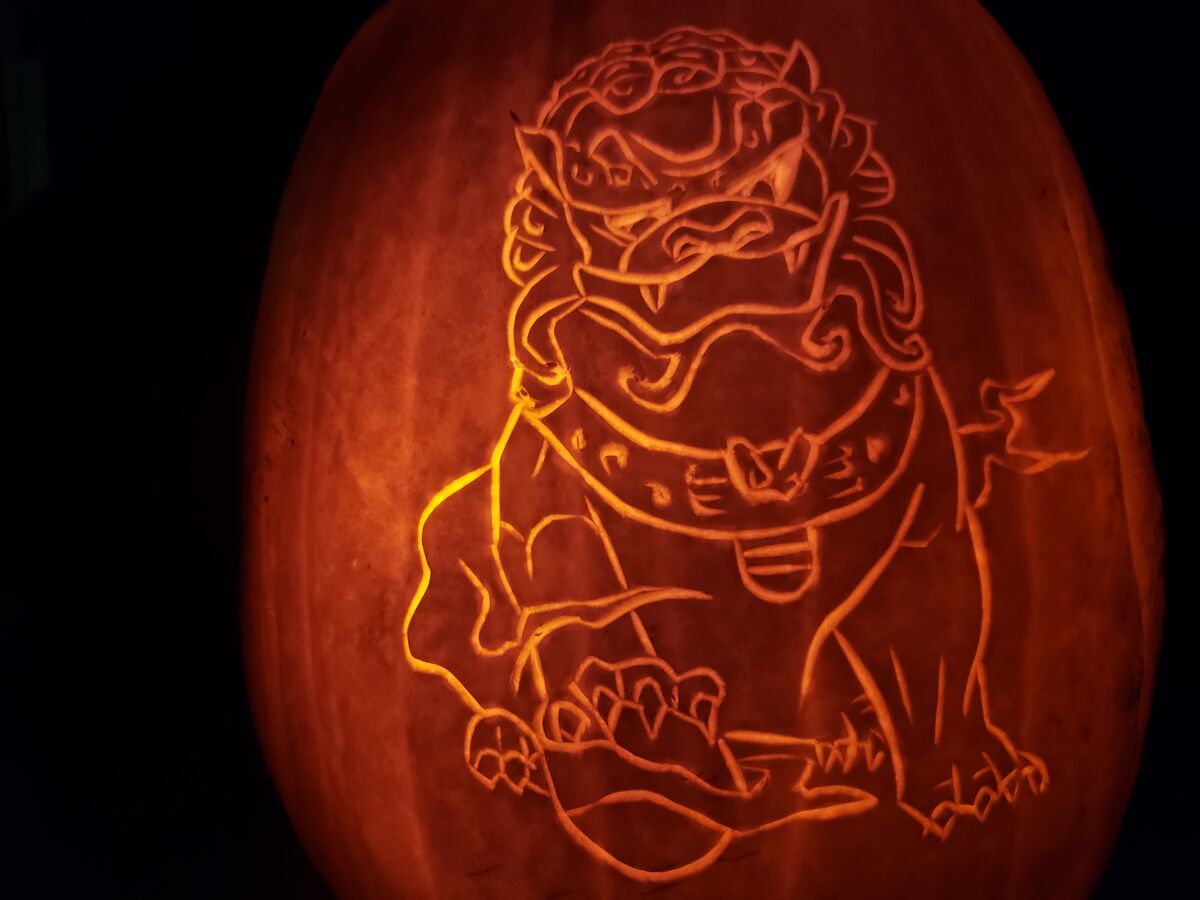 A pumpkin carved with a lucky lion.