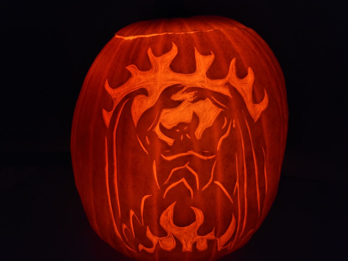 A pumpkin carved with Chernabog from Fantasia.