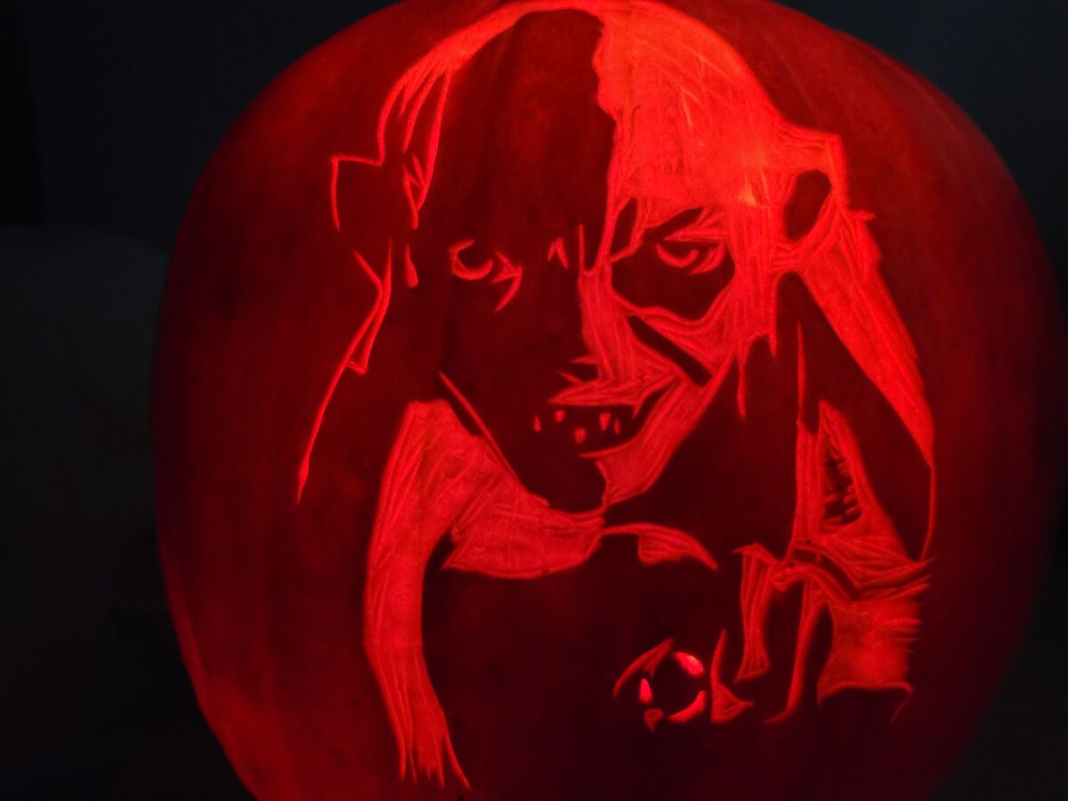 A pumpkin carved with Gollum from The Hobbit.
