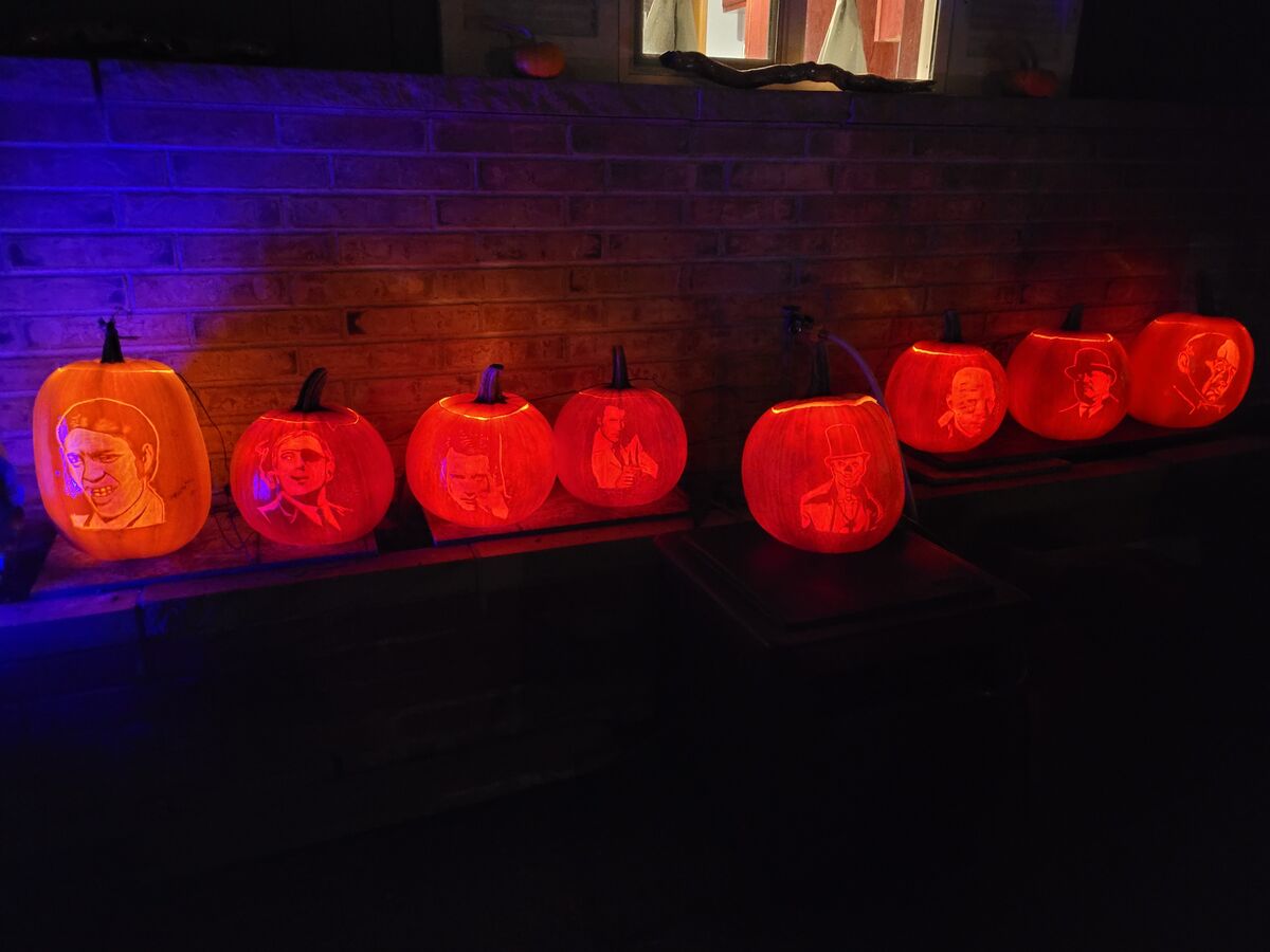 A group of pumpkins carved with James Bond villains.