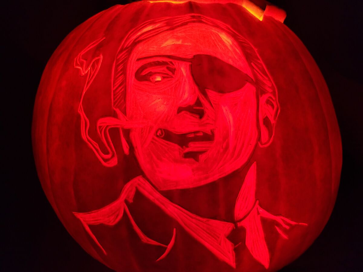 A pumpkin carved with Emilio Largo from Thunderball.