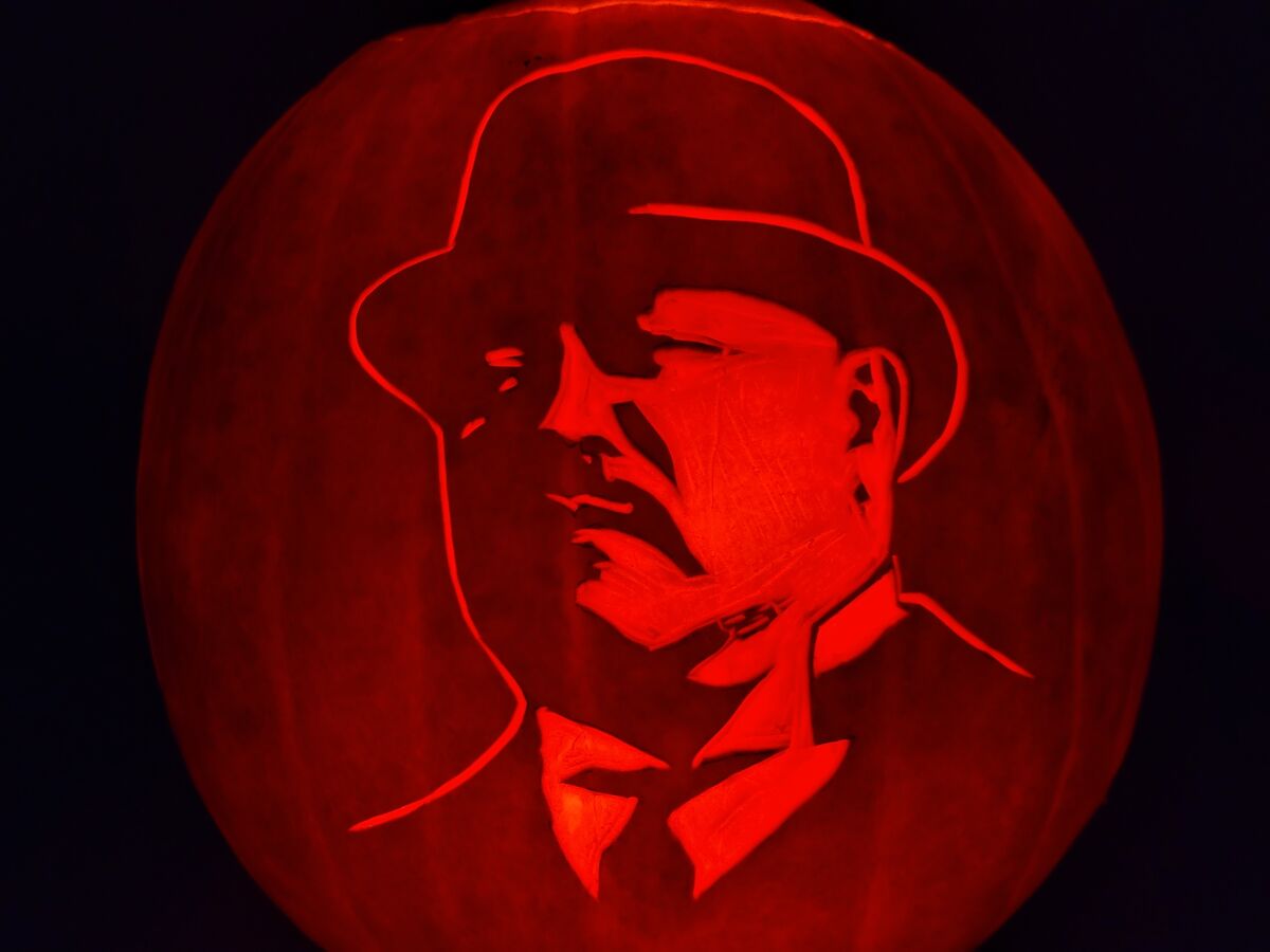 A pumpkin carved with Oddjob from Goldfinger.