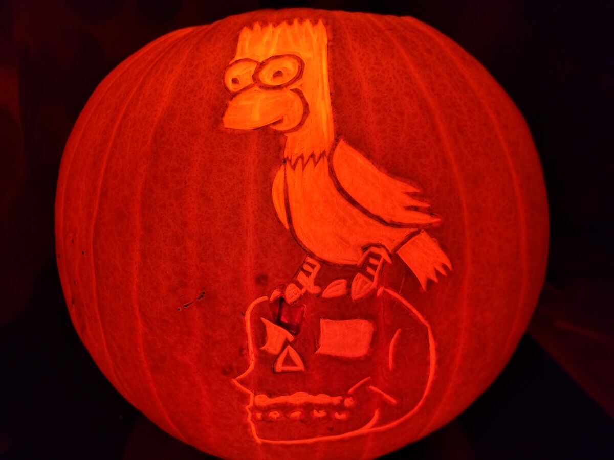 A pumpkin carved with Bart Simpson from The Simpsons.