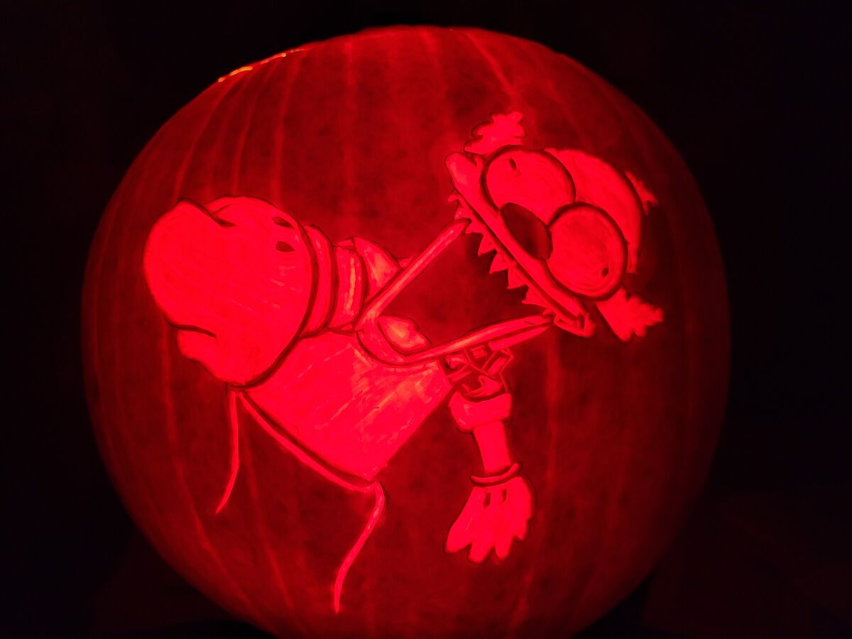 A pumpkin carved with Krusty the Clown from The Simpsons.